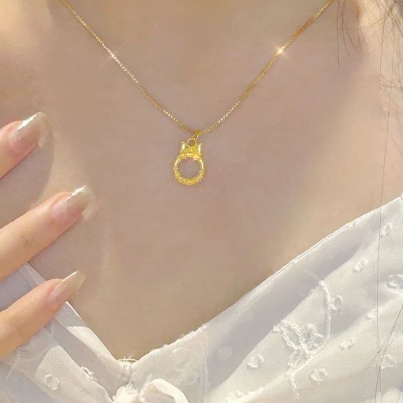 ゴールドネックレス リボン付き円型モチーフペンダント
